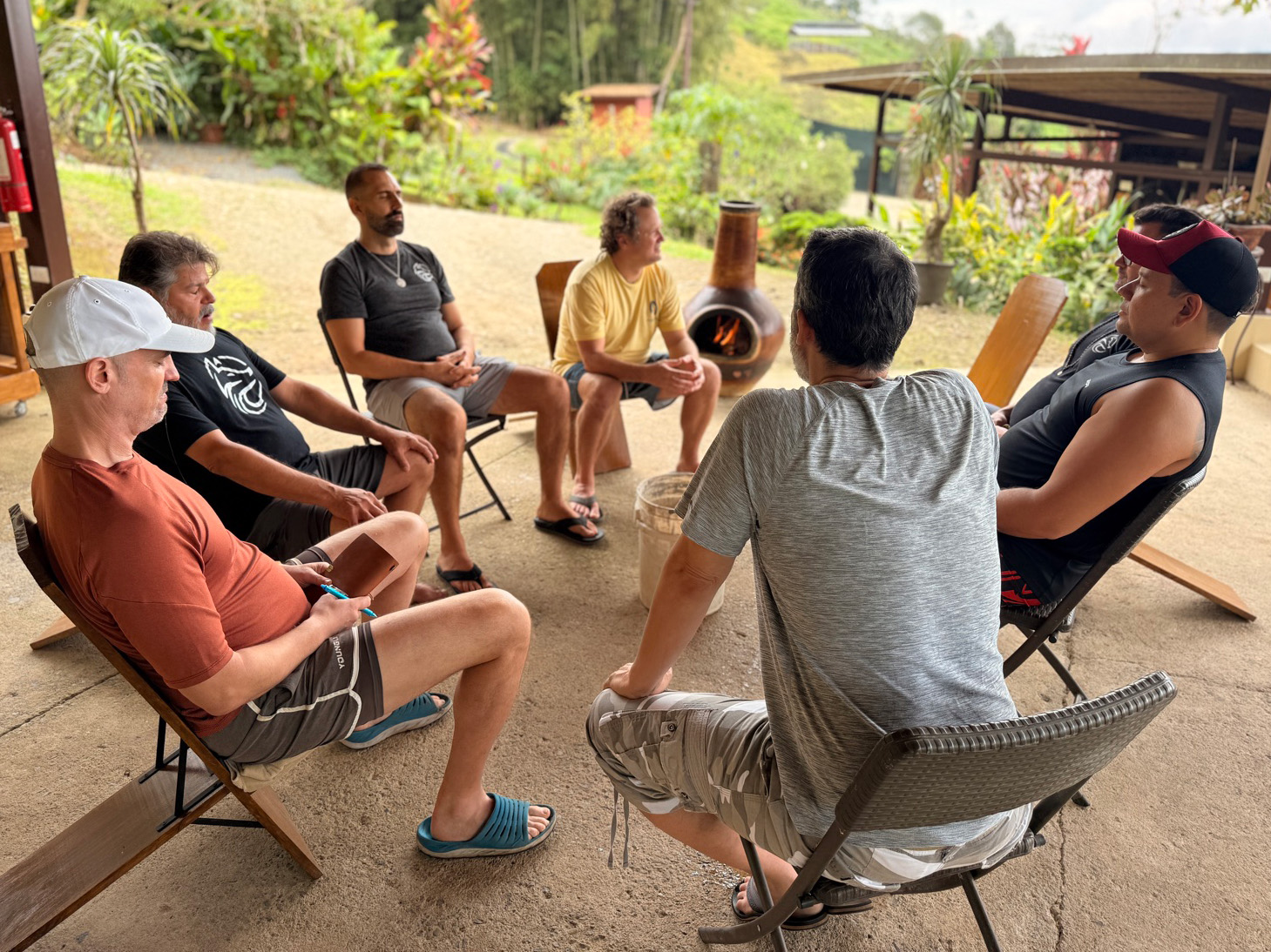 Men joining a Wolfpack Brotherhood circle